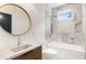 Stylish bathroom featuring a soaking tub, tile shower, and modern vanity at 1327 Harvard Ne Rd, Atlanta, GA 30306