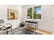 Bright office space with large window, stylish desk, and wood floors at 1327 Harvard Ne Rd, Atlanta, GA 30306