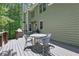Inviting back deck with outdoor dining set and grill, perfect for entertaining and enjoying the outdoors at 1604 Summersweet Ln, Dacula, GA 30019