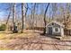 Backyard featuring a play set and storage shed at 1604 Summersweet Ln, Dacula, GA 30019