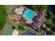 Community clubhouse with a pool, playground, and basketball courts offering activities for the whole Gathering at 1604 Summersweet Ln, Dacula, GA 30019