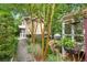Charming exterior with lush landscaping and a quaint walkway at 228 Clarion Ave, Decatur, GA 30030