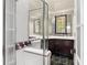 Clean bathroom with glass shower doors and dark wood cabinets at 228 Clarion Ave, Decatur, GA 30030