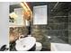 Stylish bathroom with mosaic tiles, unique fixtures, and natural lighting at 228 Clarion Ave, Decatur, GA 30030