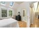 Bright bedroom with natural light from windows and skylights at 228 Clarion Ave, Decatur, GA 30030