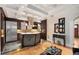 Open-concept kitchen with stainless steel appliances and custom cabinets at 228 Clarion Ave, Decatur, GA 30030