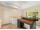 Bright laundry room area with door to the exterior and counter space at 228 Clarion Ave, Decatur, GA 30030