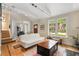 Bright living room featuring hardwood floors and large windows enhances the space at 228 Clarion Ave, Decatur, GA 30030