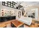 Bright living room featuring custom built-ins and natural light enhances the home's aesthetic appeal at 228 Clarion Ave, Decatur, GA 30030