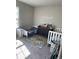 This sunny room offers two toddler beds and a place to store clothing and toys at 30 Sloane Ct, Covington, GA 30016