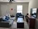 Cozy living room featuring neutral walls and flooring, plus stylish, comfortable seating at 30 Sloane Ct, Covington, GA 30016