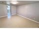 Spacious basement featuring tiled flooring and neutral-colored walls at 3082 Dove Way, Decatur, GA 30033
