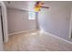 Bedroom featuring tile floors, a ceiling fan, and natural light at 3082 Dove Way, Decatur, GA 30033