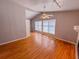Bright living room featuring hardwood floors, ceiling fan and natural light at 3082 Dove Way, Decatur, GA 30033