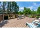 Spacious back deck with a hammock and seating area, offering great outdoor leisure space at 1130 S Rudder Rd, Cumming, GA 30041
