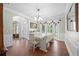 Bright and airy dining room showcasing hardwood floors at 1130 S Rudder Rd, Cumming, GA 30041