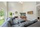 Bright living room featuring a fireplace and modern furnishings at 1130 S Rudder Rd, Cumming, GA 30041