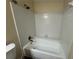 Classic bathroom featuring a tiled tub-shower, with neutral walls and tile flooring at 120 Squirrel Way, Atlanta, GA 30349