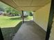 View of the covered concrete path to the main entry at 120 Squirrel Way, Atlanta, GA 30349