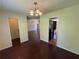 Cozy dining room showcasing hardwood floors and access to the kitchen at 120 Squirrel Way, Atlanta, GA 30349