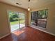 Cozy dining area with a sliding glass door leading to the backyard at 120 Squirrel Way, Atlanta, GA 30349