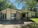 Inviting single-story home with a covered carport and stone accents at 120 Squirrel Way, Atlanta, GA 30349