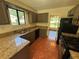 Traditional kitchen with granite countertops and a large window that provides plenty of natural light at 120 Squirrel Way, Atlanta, GA 30349