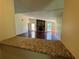 Open living room with fireplace and abundant natural light at 120 Squirrel Way, Atlanta, GA 30349
