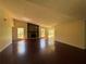 Spacious living room featuring a stone fireplace and ample natural light at 120 Squirrel Way, Atlanta, GA 30349