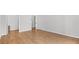 Spacious bedroom featuring hardwood floors, neutral paint, and multiple doorways at 3532 Paces Nw Pl, Atlanta, GA 30327