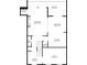 Floorplan of the lower level with living room, dining area, kitchen, and balcony at 3532 Paces Nw Pl, Atlanta, GA 30327