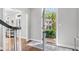 Welcoming foyer showcasing hardwood floors and a view of the exterior at 3532 Paces Nw Pl, Atlanta, GA 30327