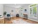 Bright living room with hardwood floors, neutral walls, and natural light at 3532 Paces Nw Pl, Atlanta, GA 30327