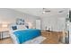Well-lit main bedroom with a king bed, ceiling fan, and neutral decor at 3532 Paces Nw Pl, Atlanta, GA 30327