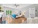 Bright main bedroom featuring a fireplace, balcony access, and elegant furnishings at 3532 Paces Nw Pl, Atlanta, GA 30327