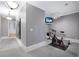 Functional workout area with exercise equipment and a mounted television, perfect for staying active at 5040 Harrington Rd, Johns Creek, GA 30022