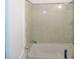 A bathroom with shower and bathtub at 1105 Oak Knoll Ter, Atlanta, GA 30315