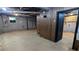 Unfinished basement offers potential with concrete walls and exposed ceiling at 2569 Dobbs Nw Dr, Kennesaw, GA 30152
