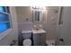 Clean and classic bathroom with tile floors, white vanity, and shower at 2569 Dobbs Nw Dr, Kennesaw, GA 30152