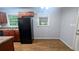 Kitchen with wooden cabinets, updated appliances, and convenient access to other rooms at 2569 Dobbs Nw Dr, Kennesaw, GA 30152