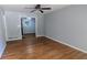 Bright living room showcasing hardwood floors and neutral paint tones at 2569 Dobbs Nw Dr, Kennesaw, GA 30152