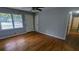 Living room with hardwood floors, neutral paint, and ample natural light at 2569 Dobbs Nw Dr, Kennesaw, GA 30152