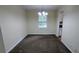 Dining room with new carpet, neutral paint and an elegant light fixture at 3656 Salem Trl, Lithonia, GA 30038