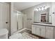 Cozy bathroom with a walk-in shower, vanity, and neutral-colored walls at 4200 E Highway 166 Rd, Carrollton, GA 30116