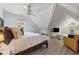Open bedroom with ceiling fan, and sitting area bathed in natural light at 4200 E Highway 166 Rd, Carrollton, GA 30116