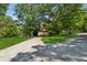 Lovely brick home with a welcoming front porch and a lush green lawn at 4200 E Highway 166 Rd, Carrollton, GA 30116
