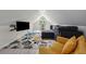 Comfortable living area featuring a large TV and modern design at 4200 E Highway 166 Rd, Carrollton, GA 30116