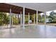 Large backyard with a covered patio overlooking well-maintained landscaping at 6765 Crofton Dr, Alpharetta, GA 30005