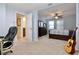 Neutral bedroom with adjacent open bathroom area, a desk and chair plus nice ceiling fan at 6765 Crofton Dr, Alpharetta, GA 30005