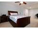 Spacious bedroom features plush carpet, neutral walls, and a comfortable queen-sized bed at 6765 Crofton Dr, Alpharetta, GA 30005